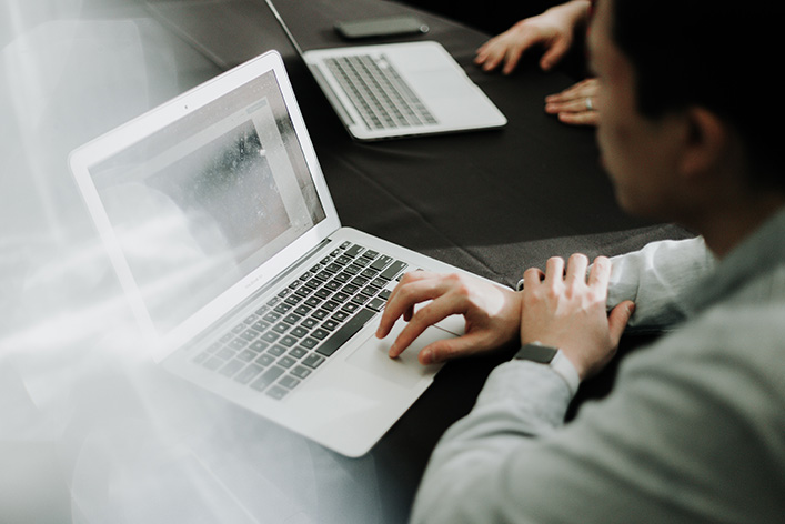 People working at their laptops. NYTLicensing.