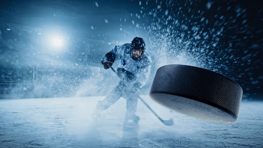 Athlete playing hockey. 