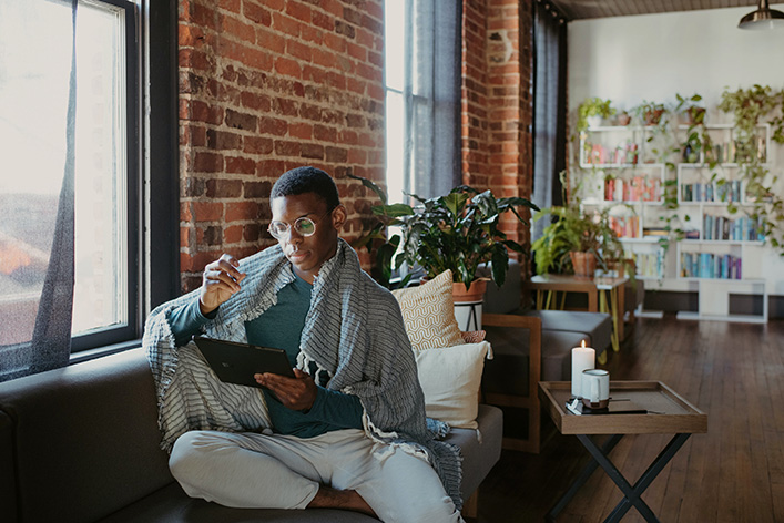 Person reading on a tablet. NYTLicensing.