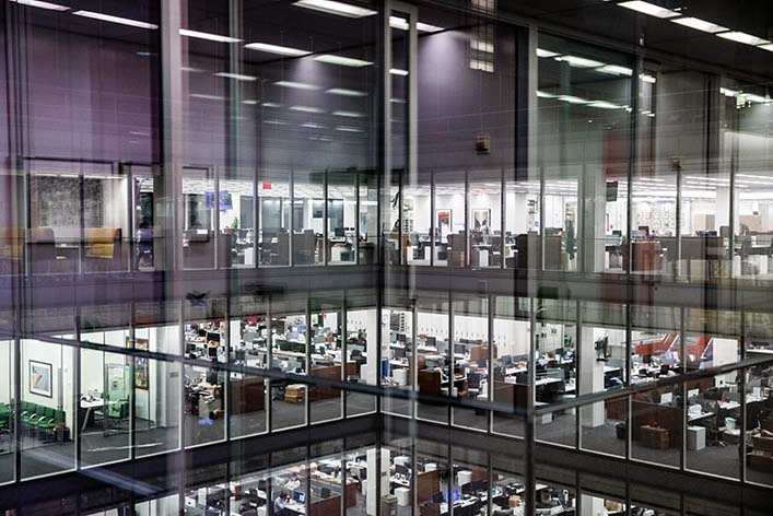 A view of The New York Times newsroom at night.