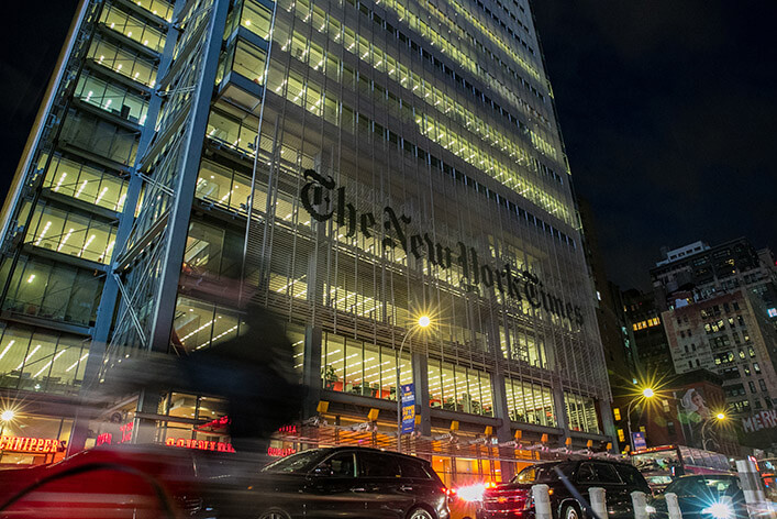 The New York Times Building at night. NYTLicensing offers strategic licensed content from The Times and other publishers.